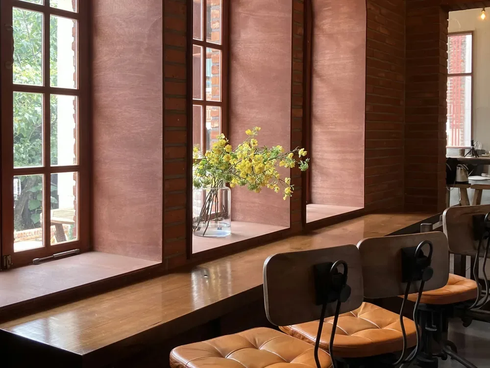 Cafe chairs by a sunny window